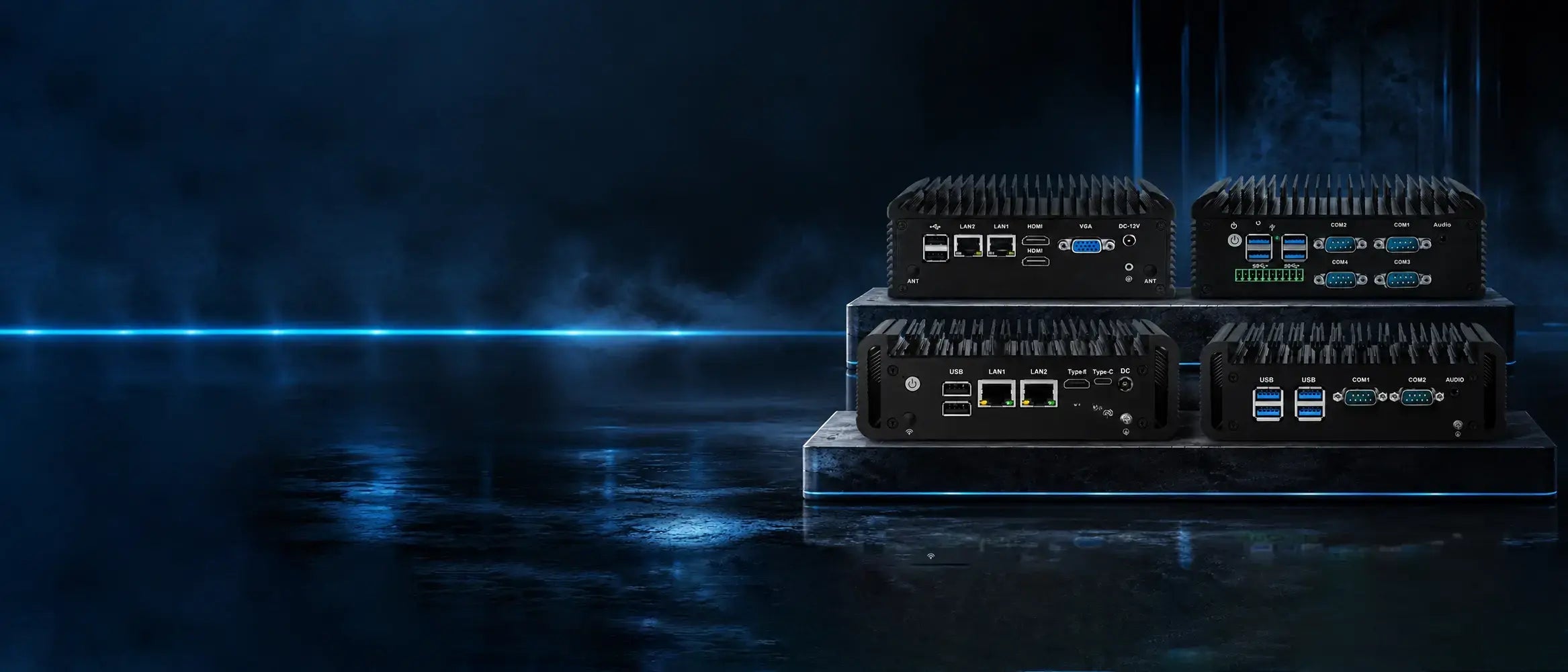 Stack of industrial computers on a dark background with blue lighting