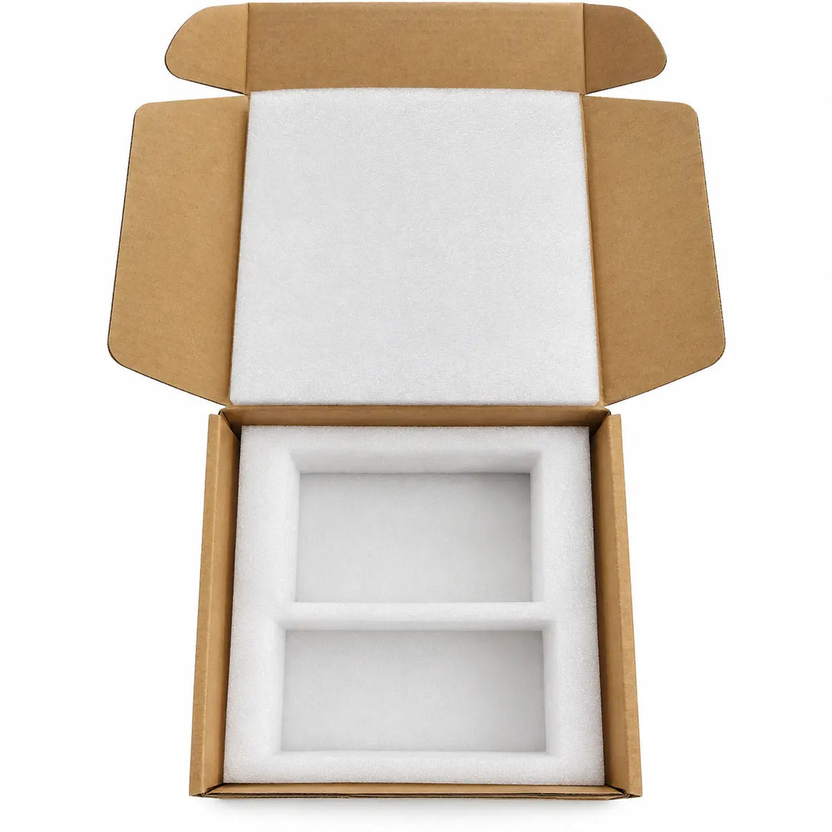 An open brown cardboard shipping box with white foam insert lining, photographed from above on a plain white background.